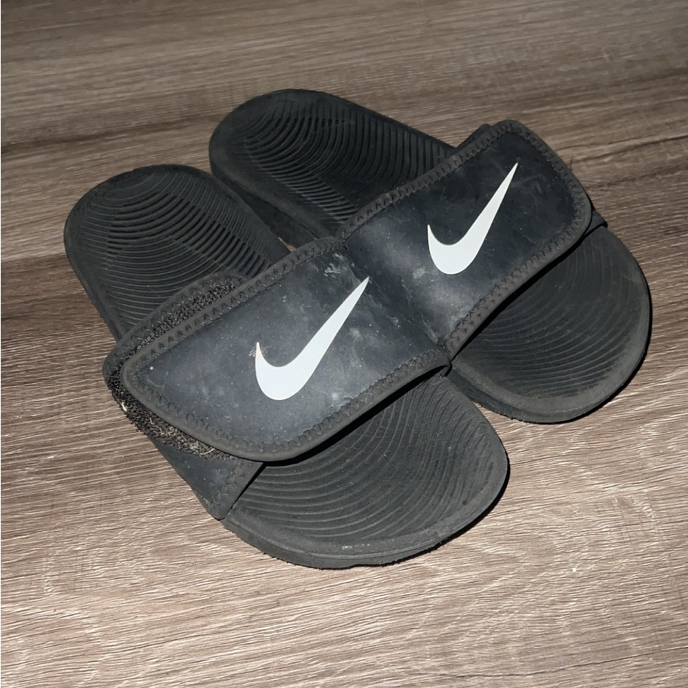 Used kids size 12c Nike slides
